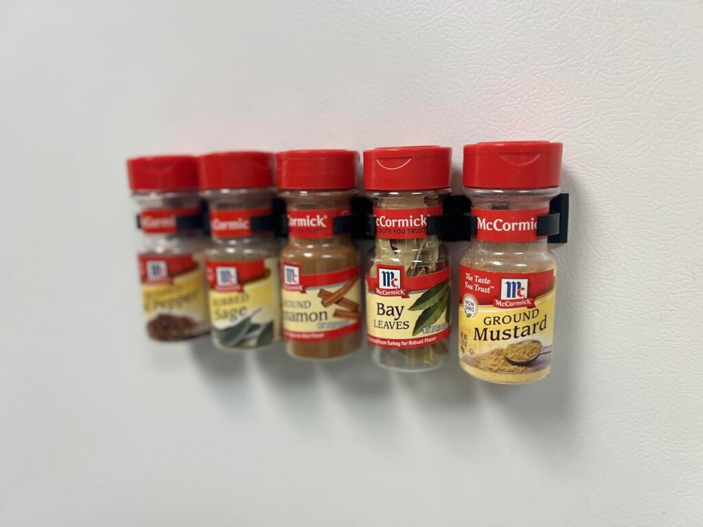Adhesive Spice Clip Gripper: This rack keeps spices easy to find without taking up counter space. You can see exactly what you have and grab what you need with ease.