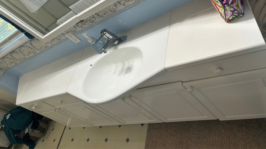 after picture of a participant from the Declutter Dash who now has a clear bathroom counter top